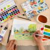 imageGrabie Watercolor Paint Set 50 Colors in Portable Box with Water Color Pallet Watercolor Papers and Brushes Ideal for Adults Artists and Hobbyists