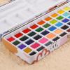 imageGrabie Watercolor Paint Set 50 Colors in Portable Box with Water Color Pallet Watercolor Papers and Brushes Ideal for Adults Artists and Hobbyists