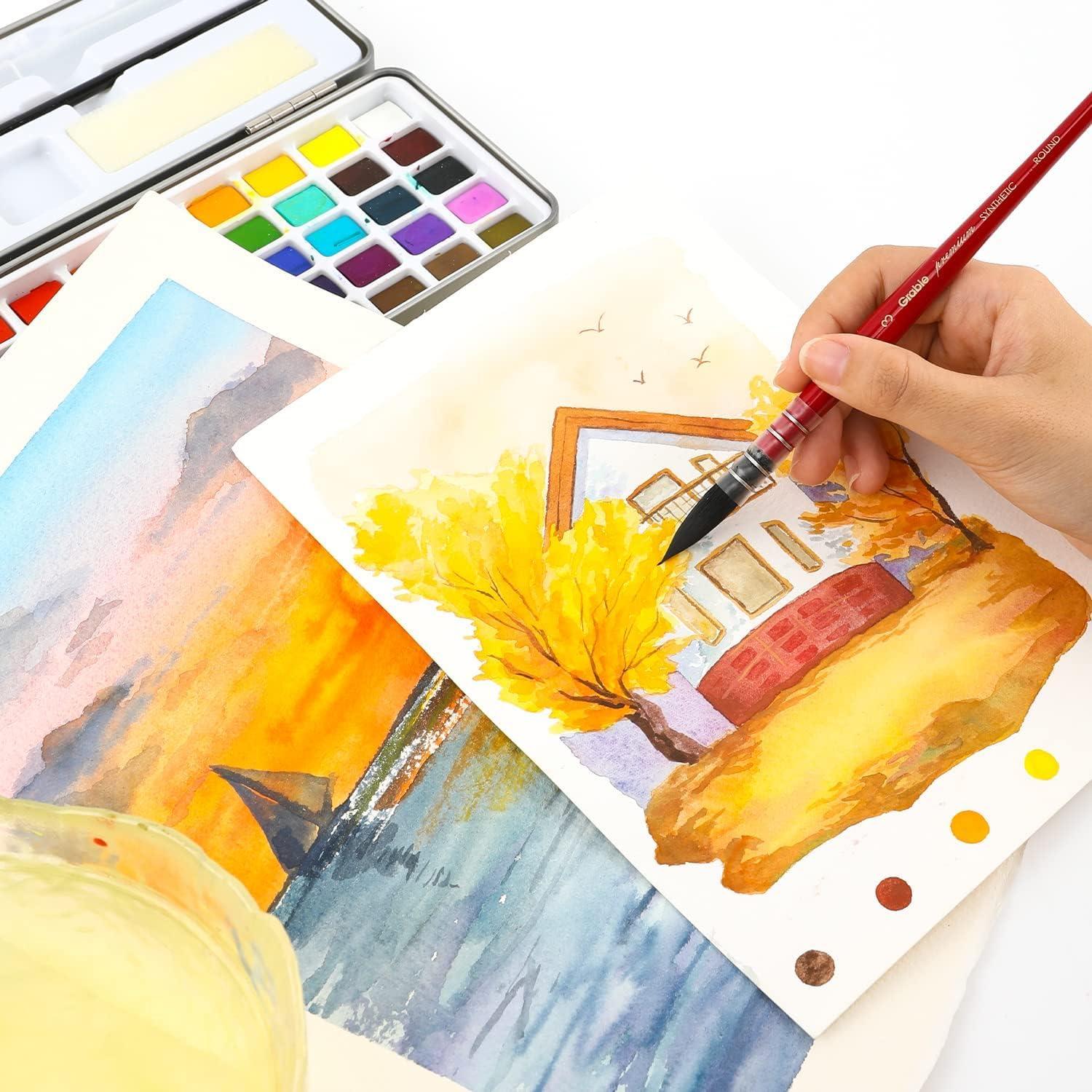 imageGrabie Watercolor Paint Set 100 Colors in Portable Box with Water Brush Pens Drawing Pencil Professional Watercolor Brushes and Watercolor Papers Perfect Starter Kit for Painting